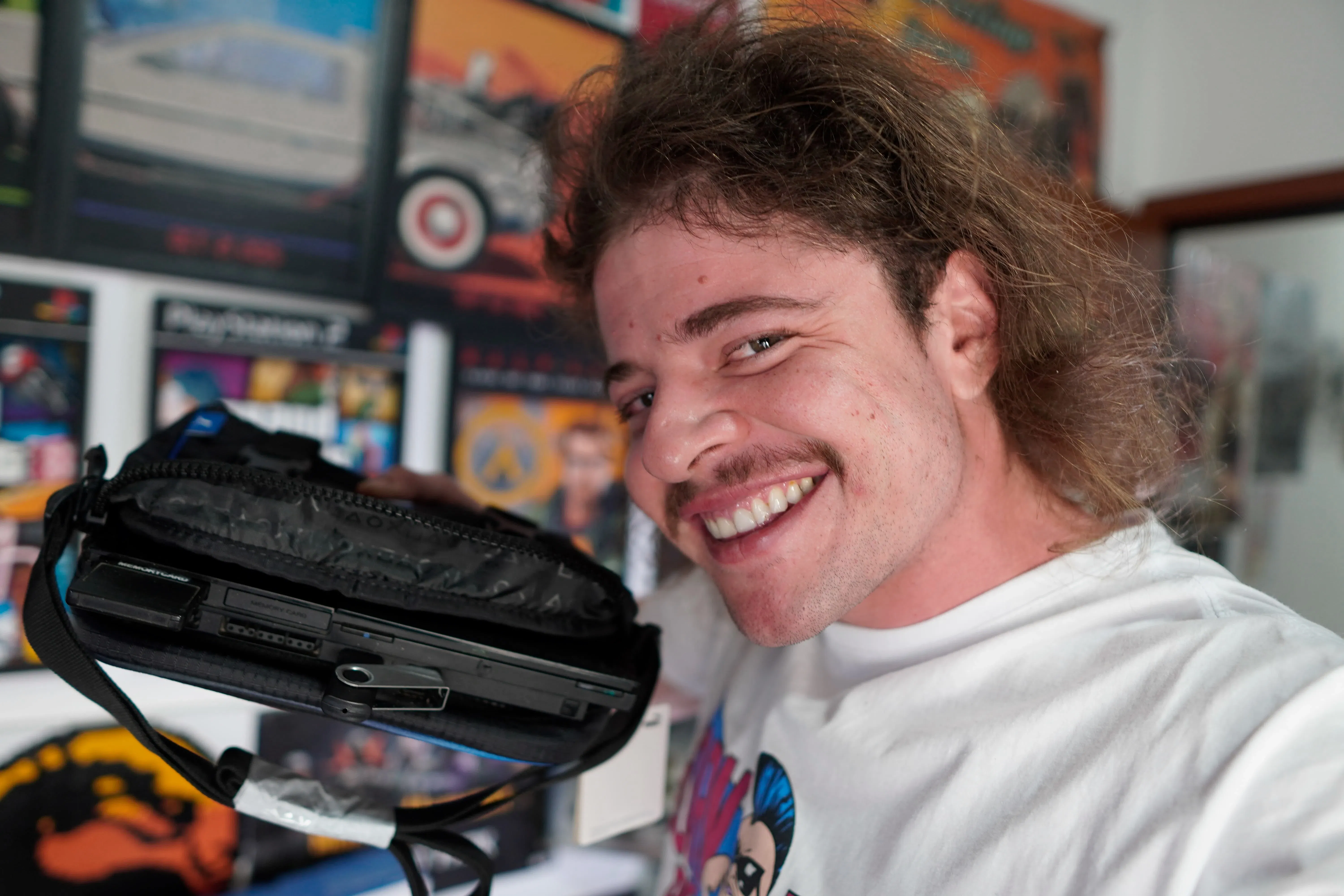 KIT BOLADO - PS2 LOTADO DE GAMES + GTA SA ORIGINAL + MOCHILA ORIGINAL DA PUMA + 2 CONTROLES SEM FIO DE BRINDE